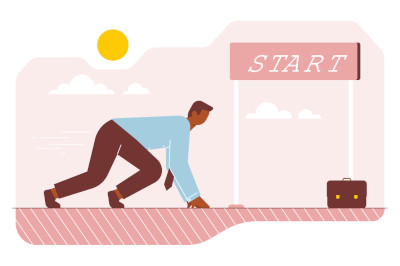 Man in a race starting position with a banner that says 'start' on it.